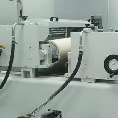 Machine d’enduction à rouleaux doubles