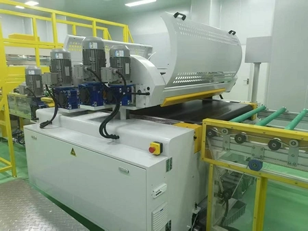 Machine d’enduction à rouleaux doubles