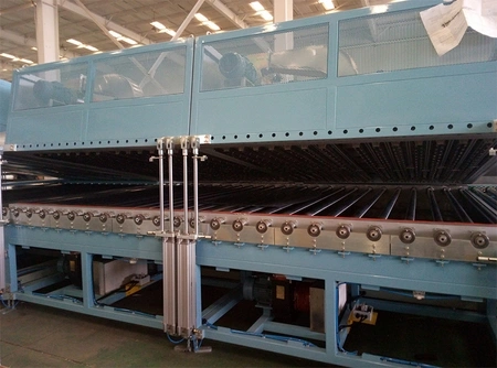 Sécheur à convoyeur à rouleaux métalliques